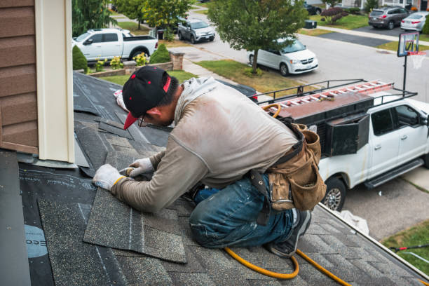Professional Roofing technician working in Revere, PA